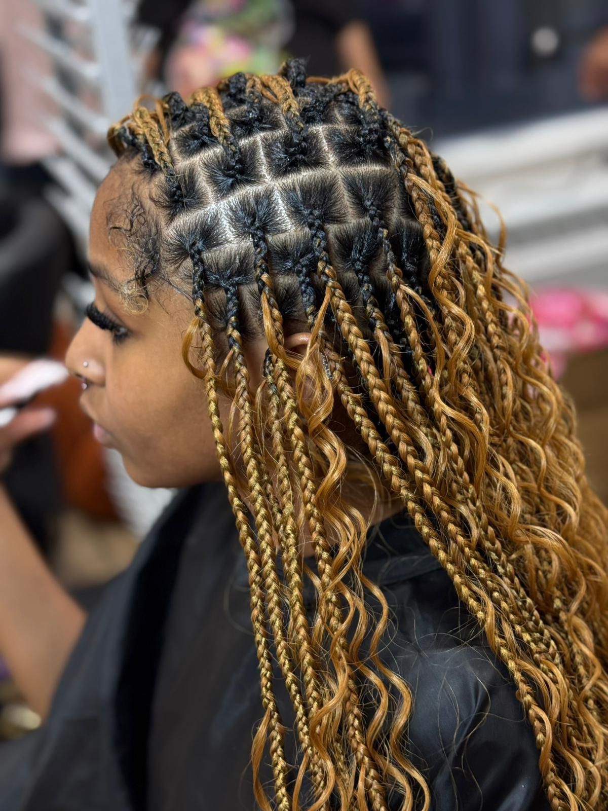Client protective hairstyle by Melanie Hair Braiding